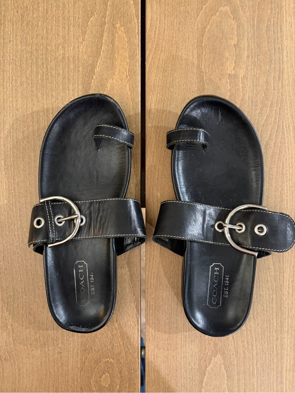 Coach Skylar Black Leather Slide Sandals with Silver Buckle Accent